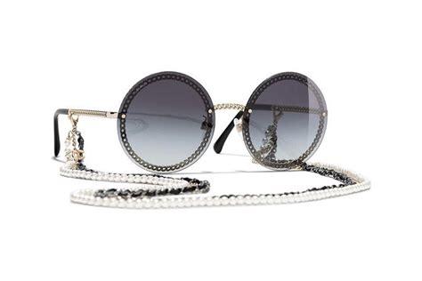 chanel round eyeglasses with chain|Chanel's Eyewear Collection Puts a Spin on Iconic Chain.